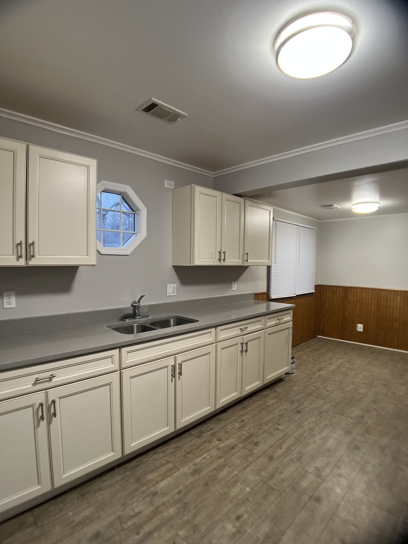 16237 Trumbull Avenue Markham, IL 60428 - Photo 5 of 18 a kitchen with sink and cabinets