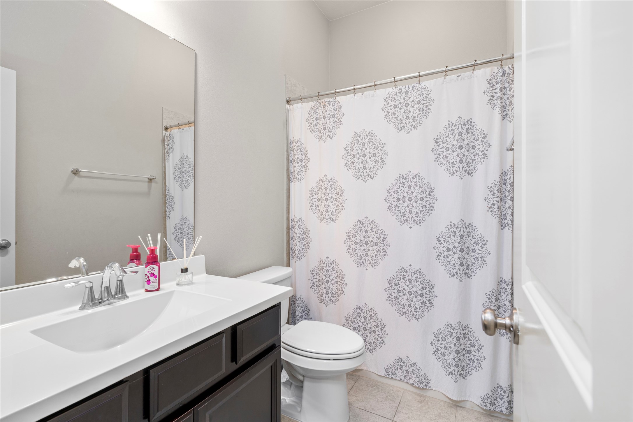 143 Castlegate Lane Houston, TX 77065 - Photo 23 of 33 Bath 2 services guests & secondary bedrooms. Well maintained home as demonstrated by upgraded flapper and fill value in both toilets (2018).