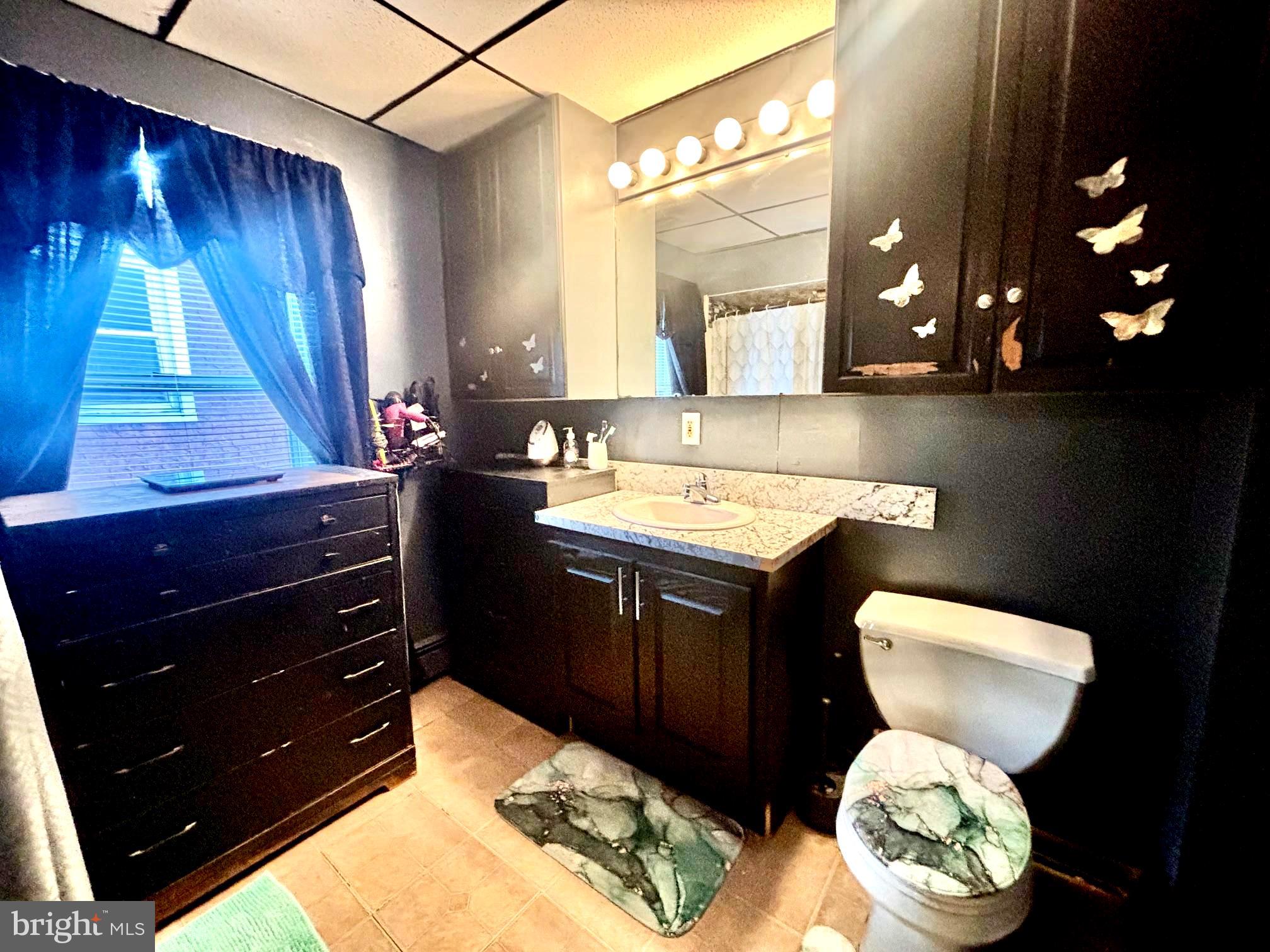 621 Lake Street Lancaster, PA 17603 - Photo 14 of 30 a bathroom with a toilet sink and mirror