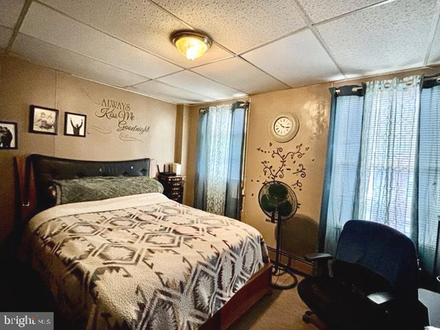 621 Lake Street Lancaster, PA 17603 - Photo 16 of 30 a bedroom with a bed and wooden floor