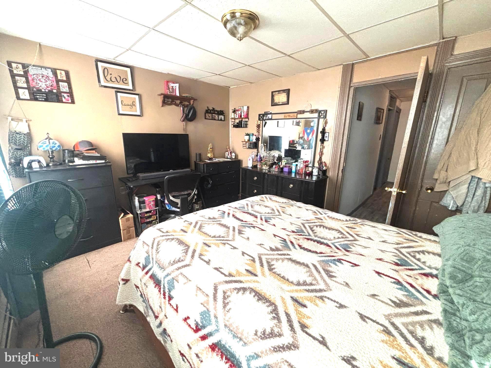 621 Lake Street Lancaster, PA 17603 - Photo 18 of 30 a bedroom with a bed and a flat screen tv