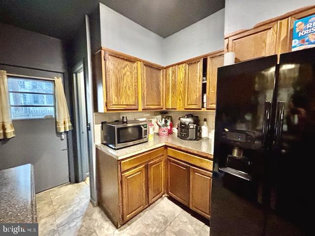 621 Lake Street Lancaster, PA 17603 - Photo 9 of 30 a kitchen with a sink a refrigerator and window