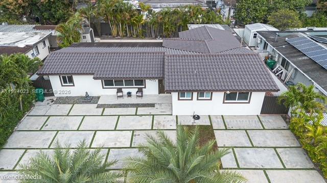 6271 Northwest 110th Street Hialeah, FL 33012 - Photo 1 of 53 a aerial view of a house with a patio