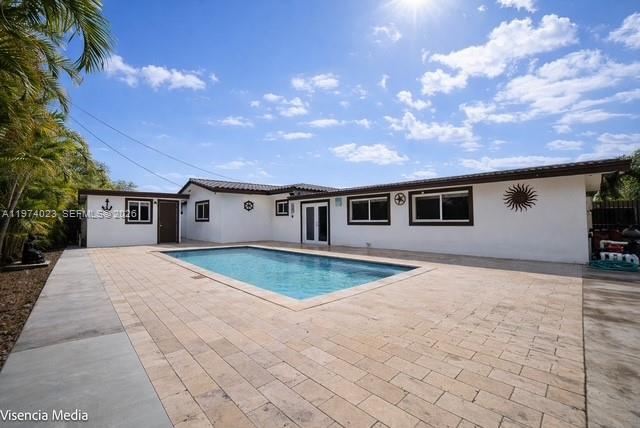 6271 Northwest 110th Street Hialeah, FL 33012 - Photo 11 of 53 a front view of a house with yard