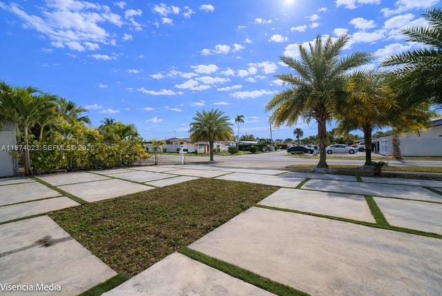 6271 Northwest 110th Street Hialeah, FL 33012 - Photo 15 of 53 a view of a yard and entertaining space