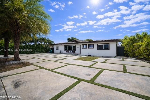 6271 Northwest 110th Street Hialeah, FL 33012 - Photo 16 of 53 a view of house with yard and swimming pool