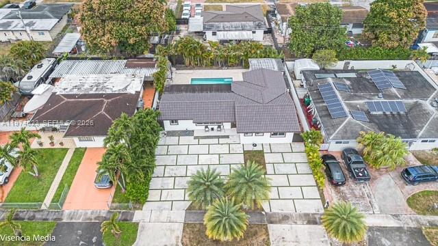6271 Northwest 110th Street Hialeah, FL 33012 - Photo 20 of 53 an aerial view of a house with a garden