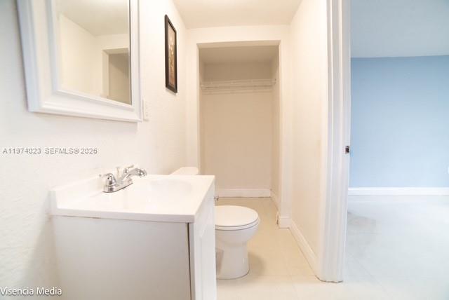 6271 Northwest 110th Street Hialeah, FL 33012 - Photo 24 of 53 a bathroom with a sink toilet and mirror