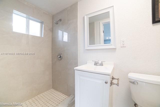 6271 Northwest 110th Street Hialeah, FL 33012 - Photo 25 of 53 a bathroom with a sink toilet and mirror
