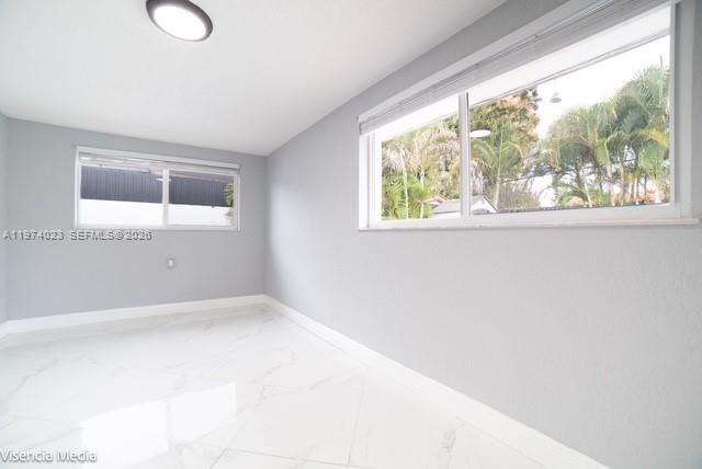 6271 Northwest 110th Street Hialeah, FL 33012 - Photo 32 of 53 a view of empty room with window