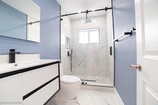 6271 Northwest 110th Street Hialeah, FL 33012 - Photo 34 of 53 a bathroom with a shower a toilet and sink