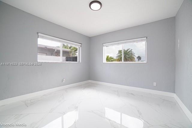 6271 Northwest 110th Street Hialeah, FL 33012 - Photo 38 of 53 a view of empty room with window