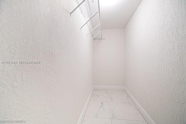 6271 Northwest 110th Street Hialeah, FL 33012 - Photo 42 of 53 a view of a room with white walls