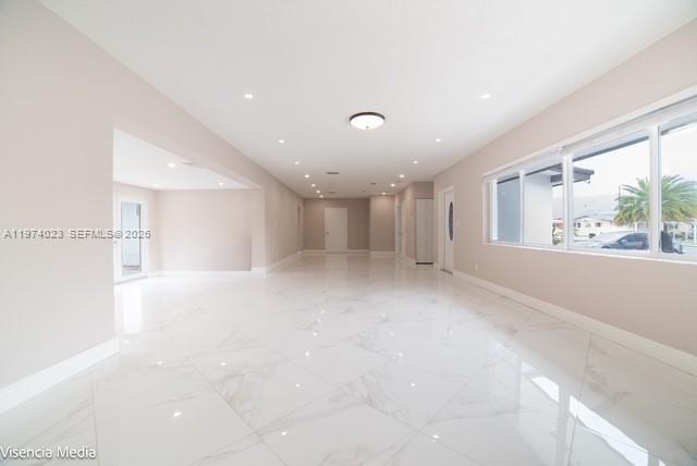 6271 Northwest 110th Street Hialeah, FL 33012 - Photo 48 of 53 a view of an empty room with a window