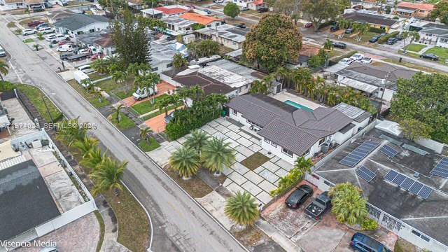 6271 Northwest 110th Street Hialeah, FL 33012 - Photo 52 of 53 an aerial view of a house with a yard