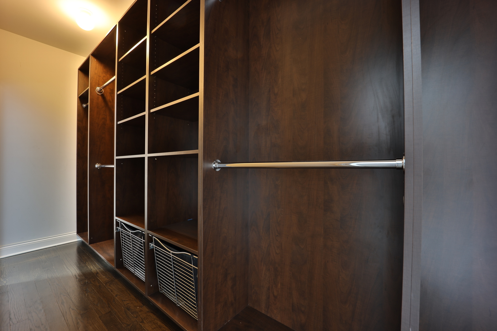 1317 West 18th Place, Unit 1F Chicago, IL 60608 - Photo 14 of 26 a view of walk in closet with empty racks