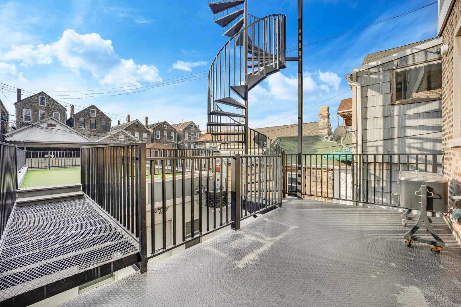 1317 West 18th Place, Unit 1F Chicago, IL 60608 - Photo 19 of 26 a view of a balcony with staircase