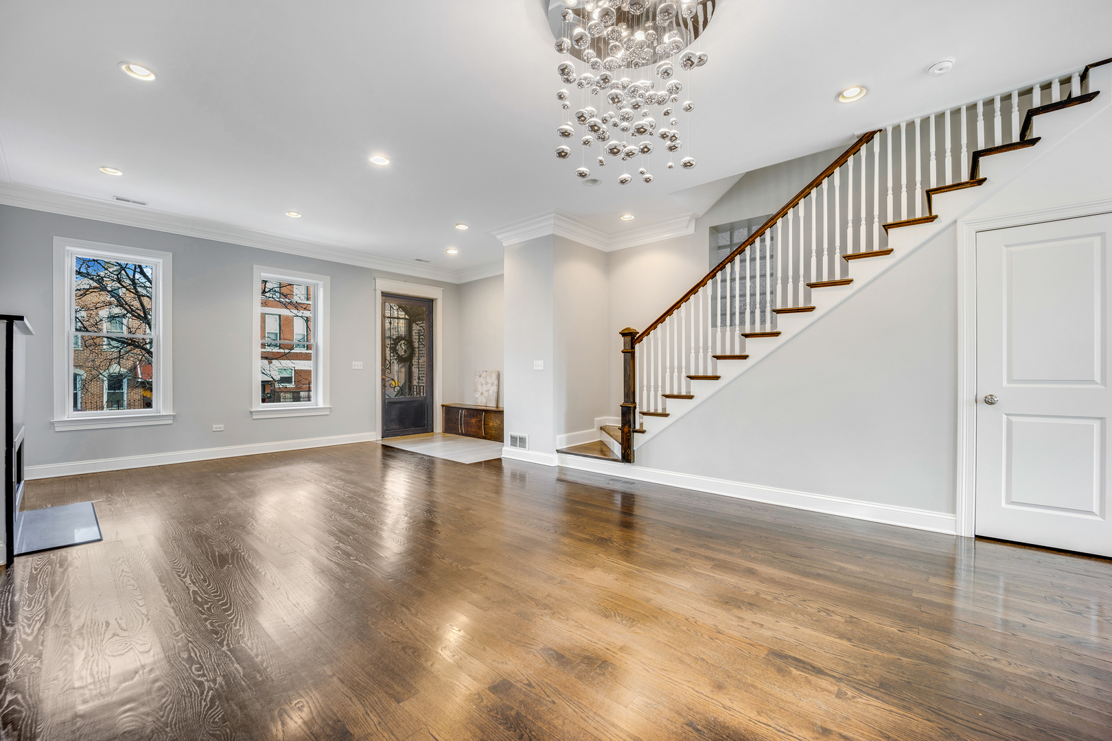 1317 West 18th Place, Unit 1F Chicago, IL 60608 - Photo 3 of 26 a view of an entryway with wooden floor