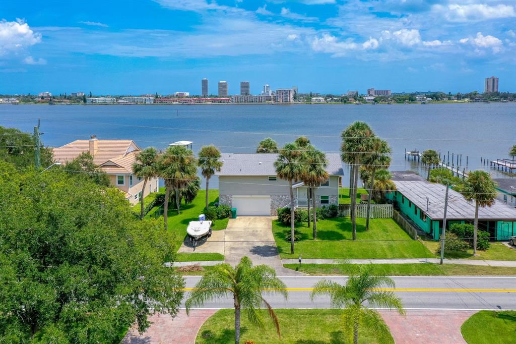 a view of a lake with a garden
