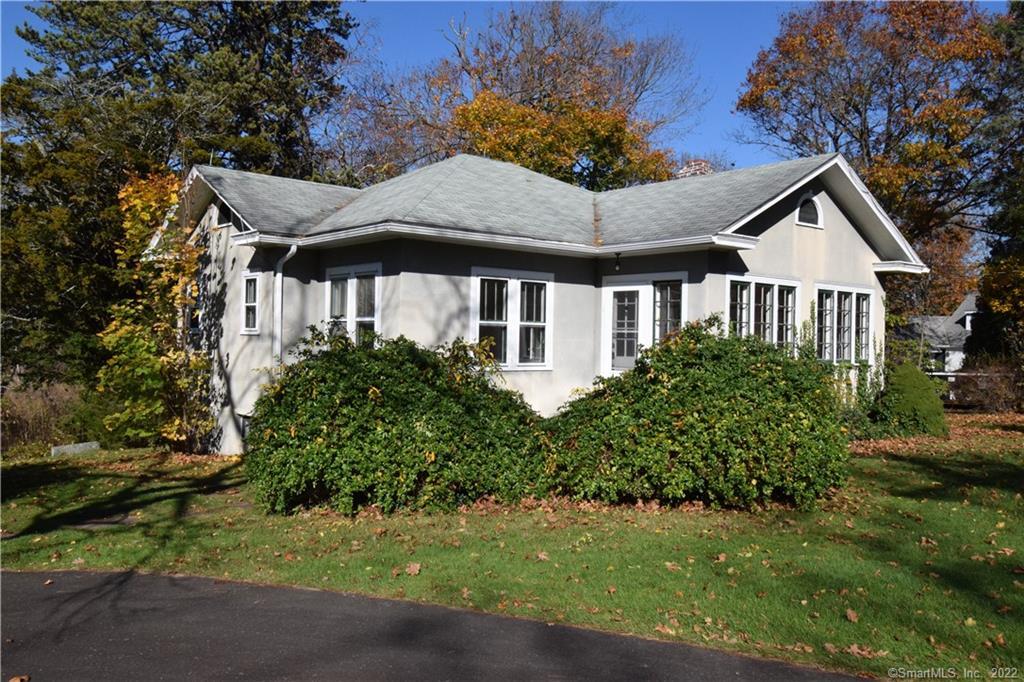 144 Neck Road Madison, CT 06443 - Photo 1 of 1 CLASSIC HIP-ROOF RANCH SET ON 1.37 ACRES