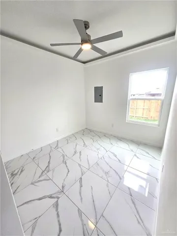 a view of an empty room and window