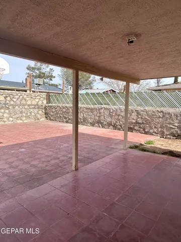 a view of large windows and an outdoor space