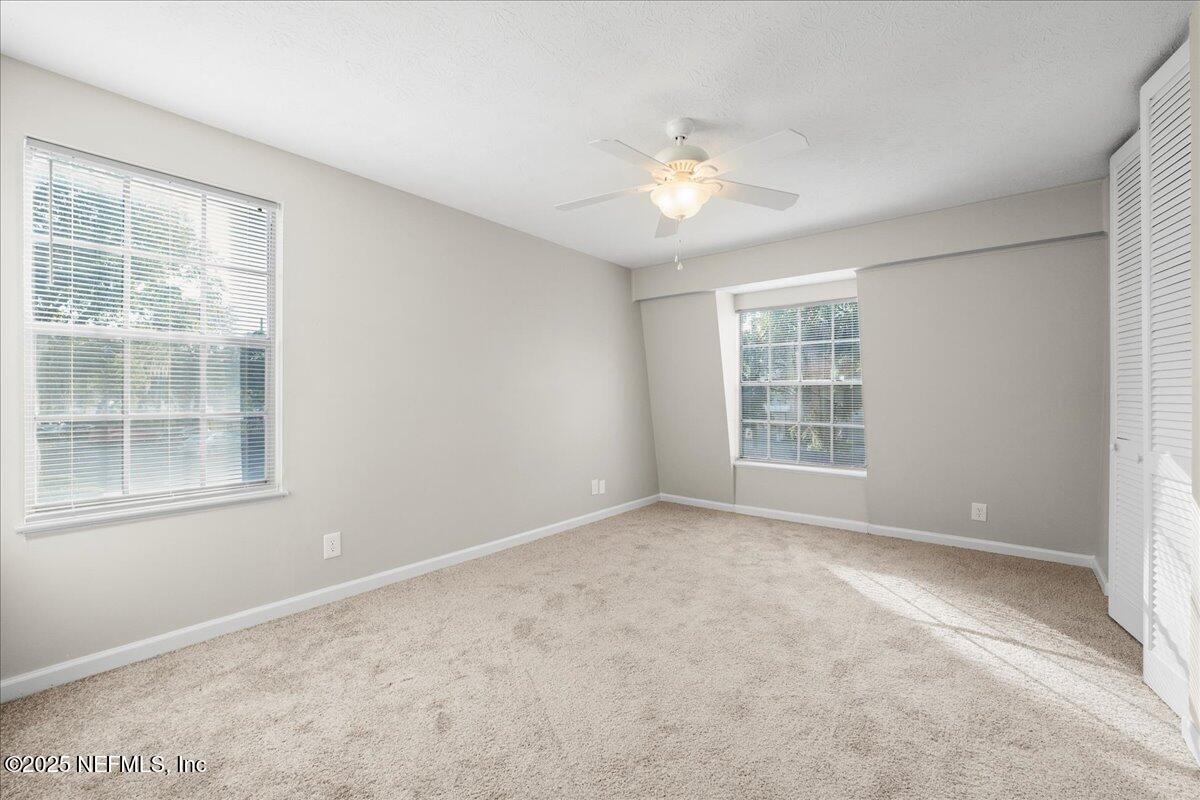 4358 Timuquana Road, Unit 208 Jacksonville, FL 32210 - Photo 14 of 28 an empty room with a window