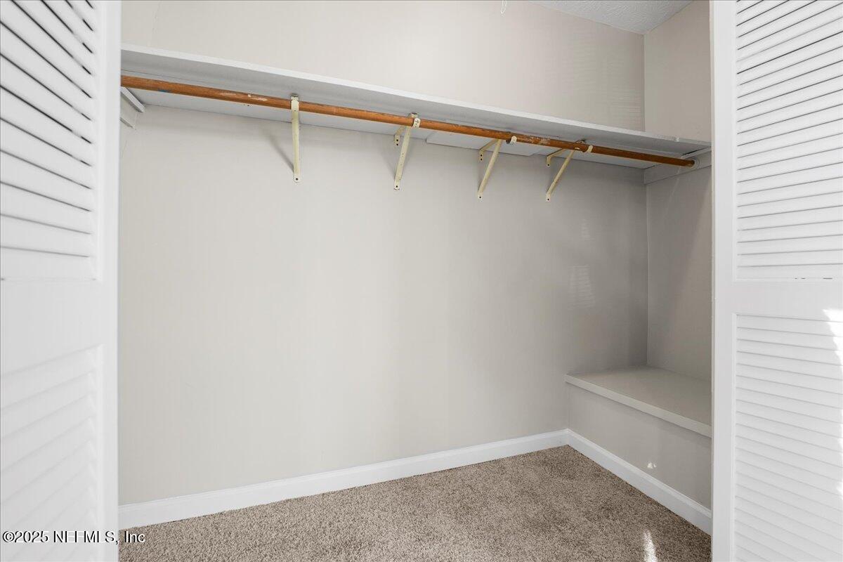 4358 Timuquana Road, Unit 208 Jacksonville, FL 32210 - Photo 16 of 28 a view of an empty walk in closet