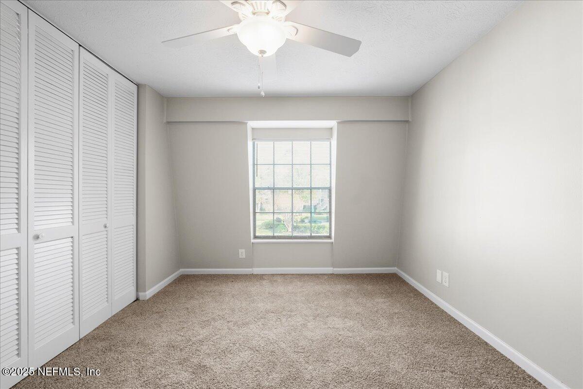 4358 Timuquana Road, Unit 208 Jacksonville, FL 32210 - Photo 20 of 28 an empty room with a window