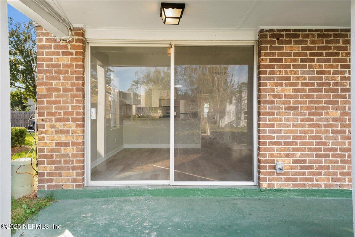 4358 Timuquana Road, Unit 208 Jacksonville, FL 32210 - Photo 25 of 28 a bathroom with a shower
