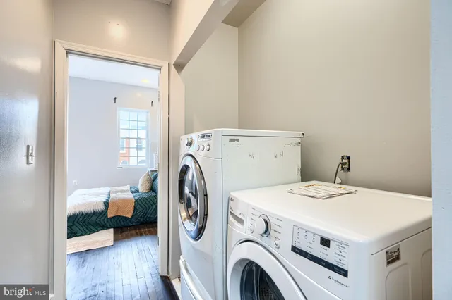 a utility room with dryer and washer