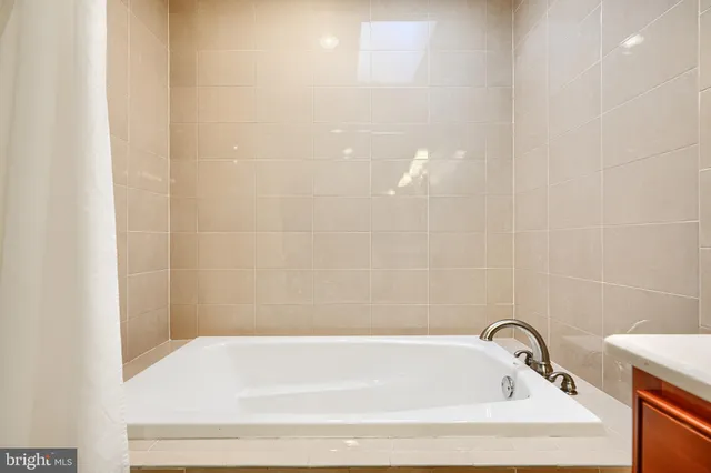 a bathroom with a bathtub