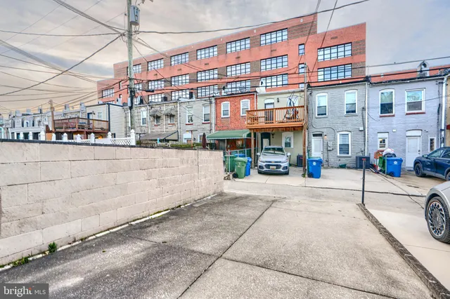 a view of a building with a street
