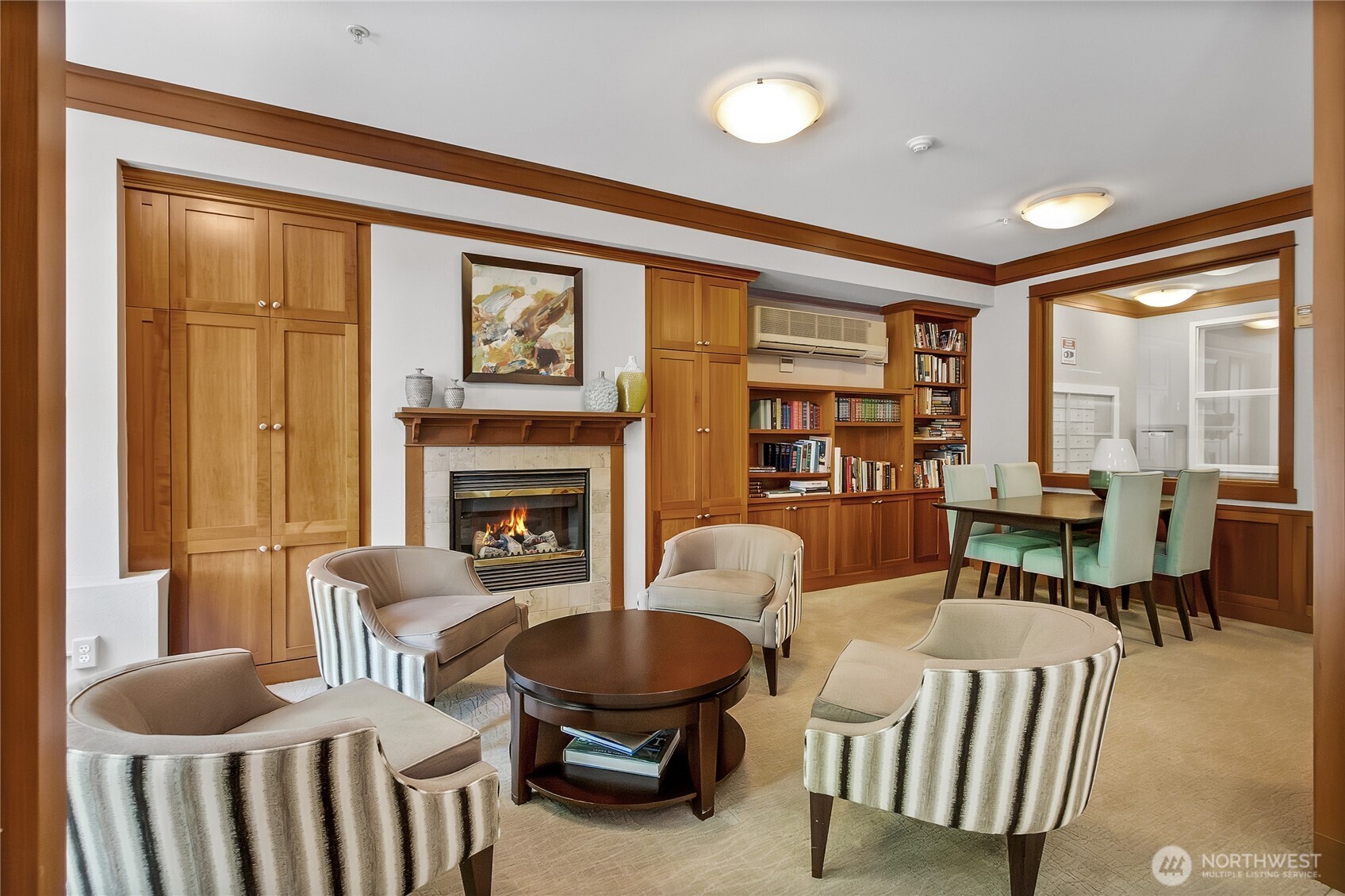 55 Williams Avenue South, Unit 209 Renton, WA 98057 - Photo 20 of 21 a living room with furniture and a fireplace