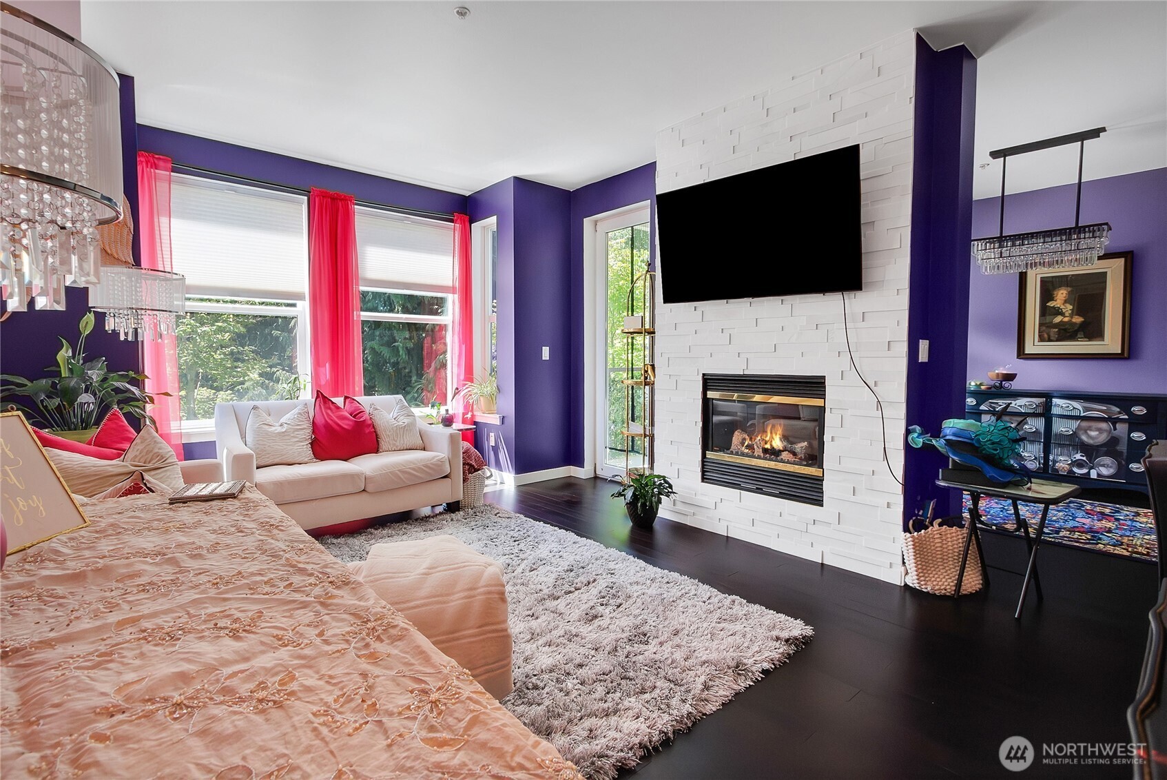 55 Williams Avenue South, Unit 209 Renton, WA 98057 - Photo 7 of 21 a living room with furniture fireplace and flat screen tv