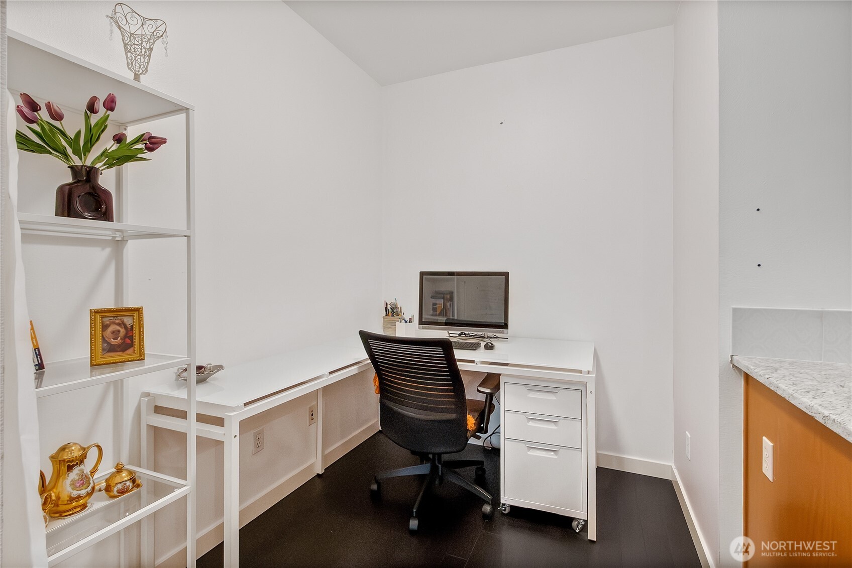 55 Williams Avenue South, Unit 209 Renton, WA 98057 - Photo 8 of 21 a workspace with furniture and wooden floor