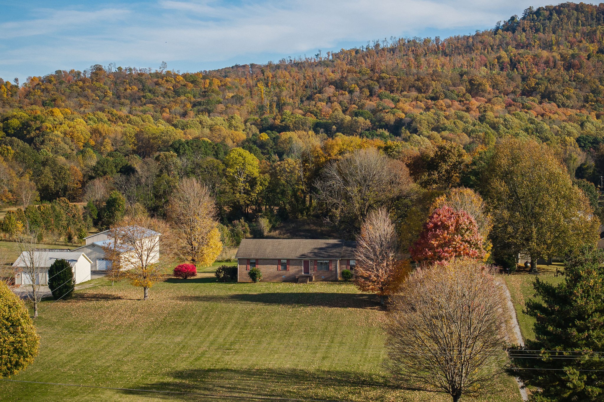 4143 Viola Road McMinnville, TN 37110 - Photo 25 of 27 a view of a house with a yard and mountain view