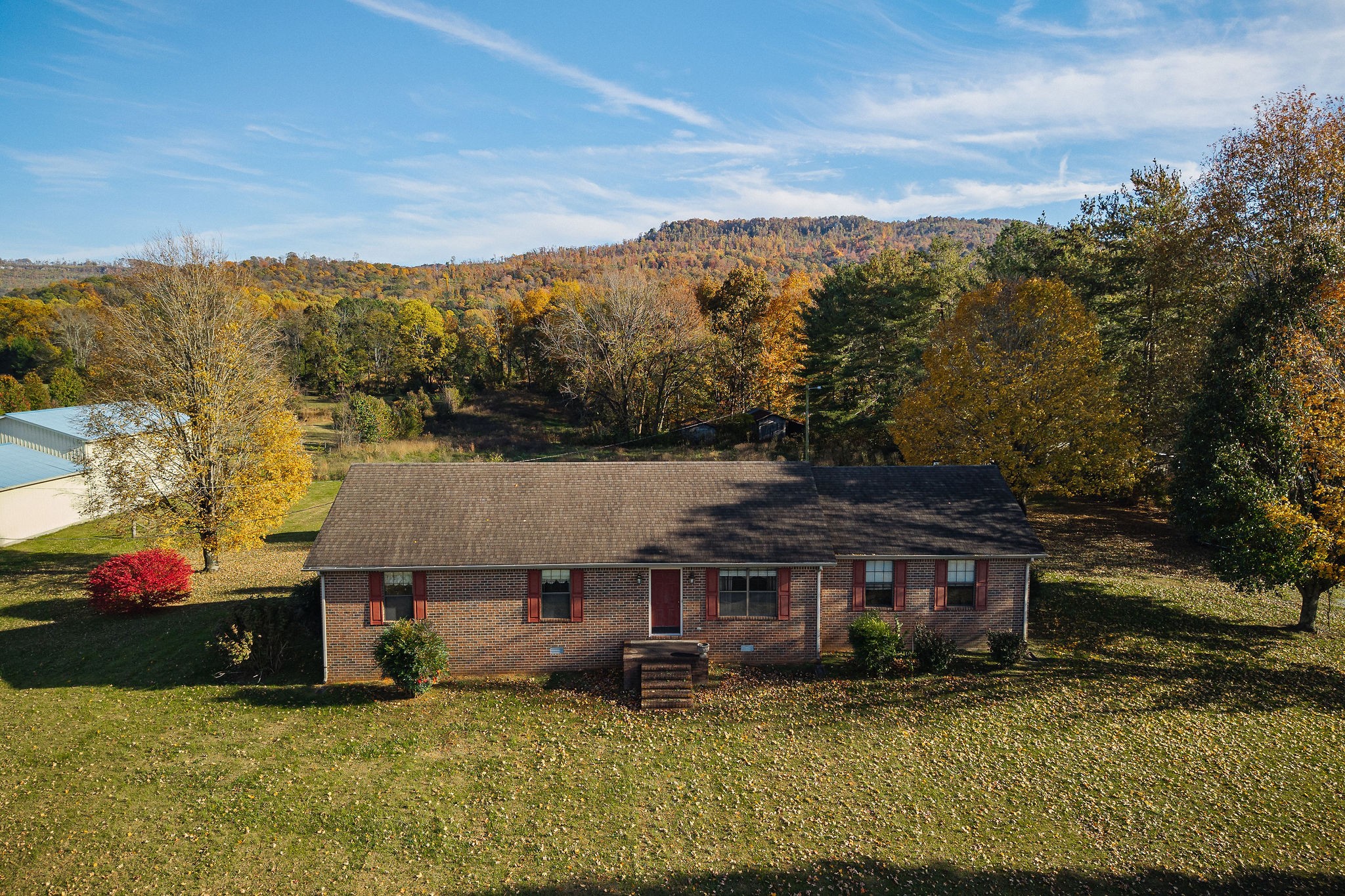 4143 Viola Road McMinnville, TN 37110 - Photo 26 of 27 a view of a house with a garden