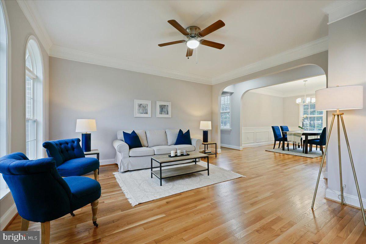 21712 Slidell Road Boyds, MD 20841 - Photo 2 of 32 a living room with furniture and a wooden floor