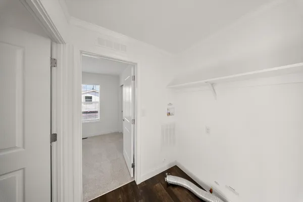 a view of small space with wooden floor