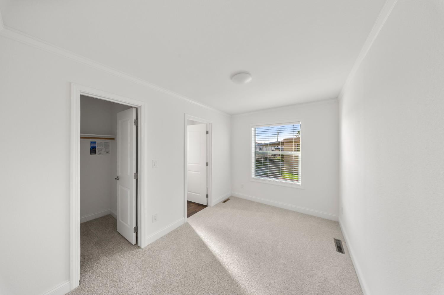 2030 East Grayson Road, Unit 44 Ceres, CA 95307 - Photo 17 of 20 a view of an empty room with a window