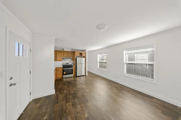a view of livingroom with furniture and wooden floor