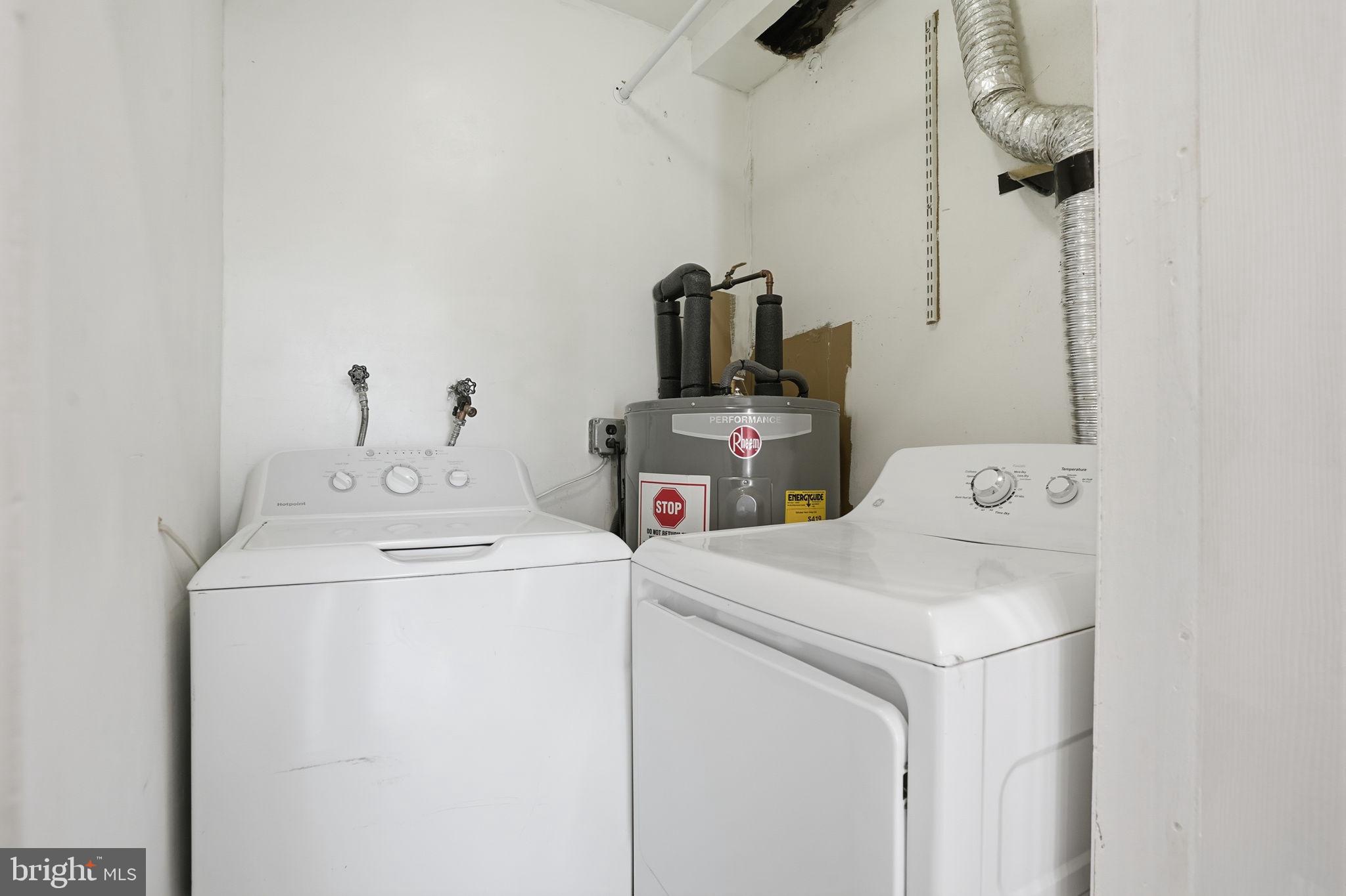 12135 Academy Road, Unit 42 Philadelphia, PA 19154 - Photo 10 of 18 a utility room with dryer and washer