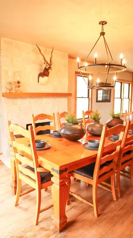 a dining room view with a table and chairs