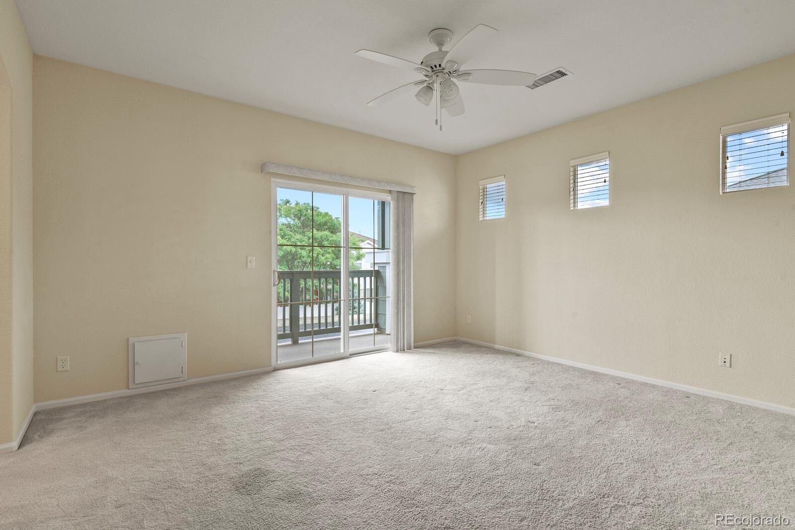 152 Whitehaven Circle Highlands Ranch, CO 80129 - Photo 16 of 25 a view of an empty room with a window