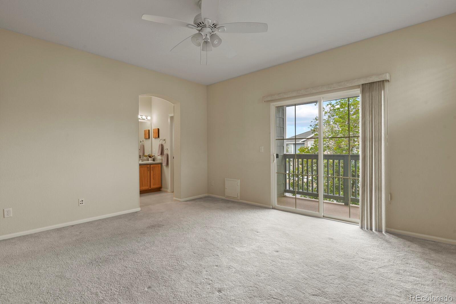 152 Whitehaven Circle Highlands Ranch, CO 80129 - Photo 17 of 25 a view of an empty room with a window