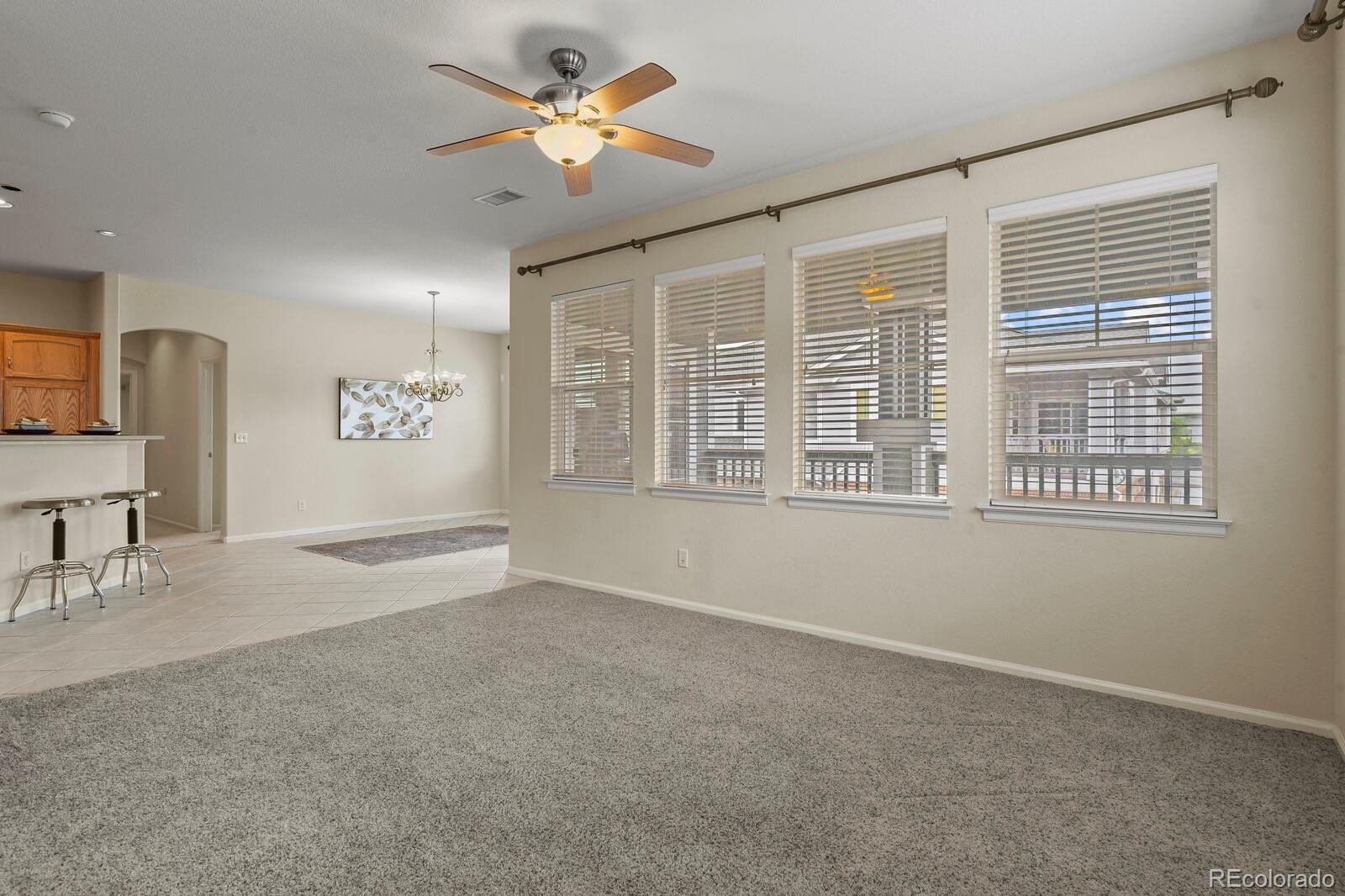 152 Whitehaven Circle Highlands Ranch, CO 80129 - Photo 4 of 25 a view of an empty room with a window