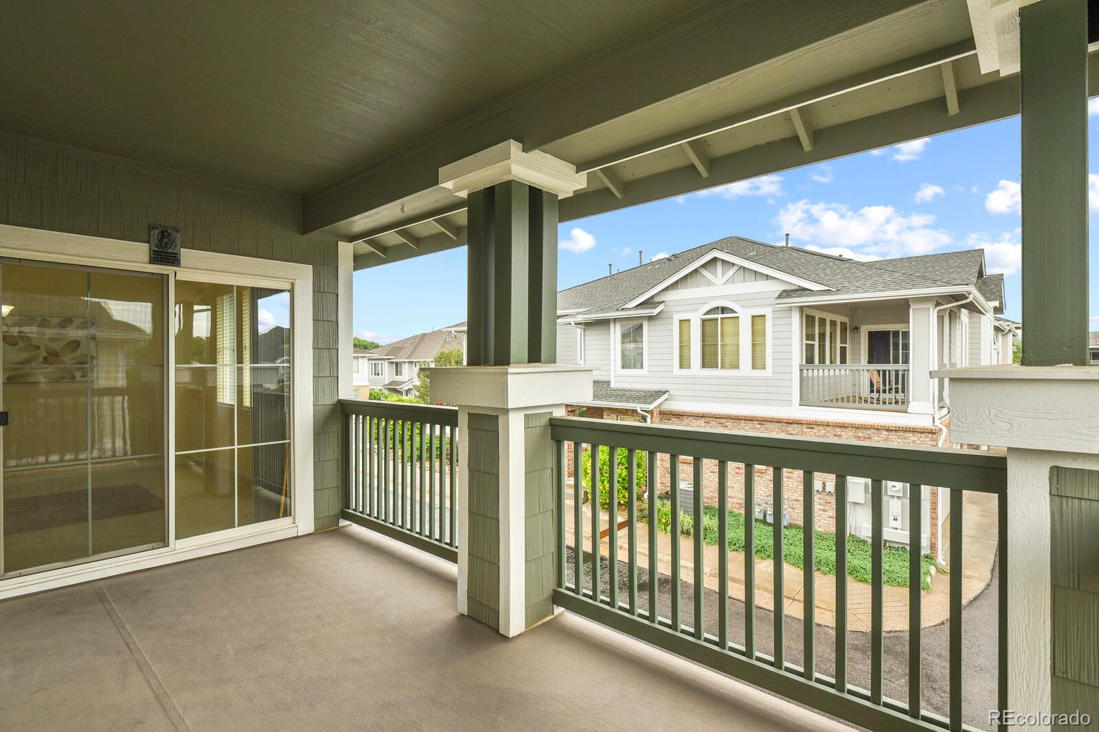 152 Whitehaven Circle Highlands Ranch, CO 80129 - Photo 9 of 25 a view of a large building with a balcony