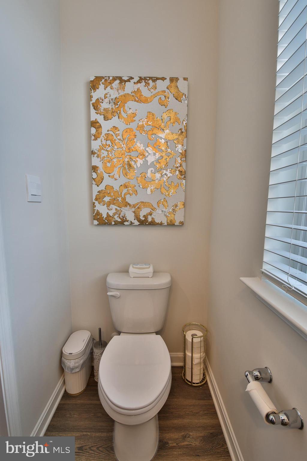 5059 Silver Oak Drive Rosedale, MD 21237 - Photo 14 of 43 a bathroom with a toilet and a sink