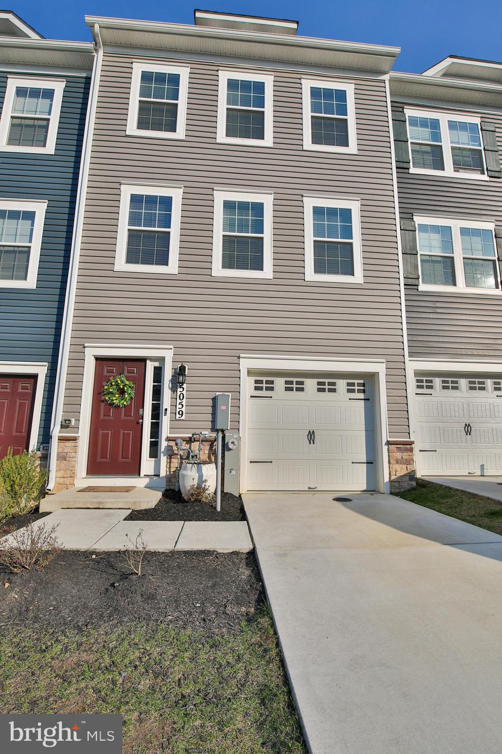 5059 Silver Oak Drive Rosedale, MD 21237 - Photo 2 of 15 Once garage, and driveway